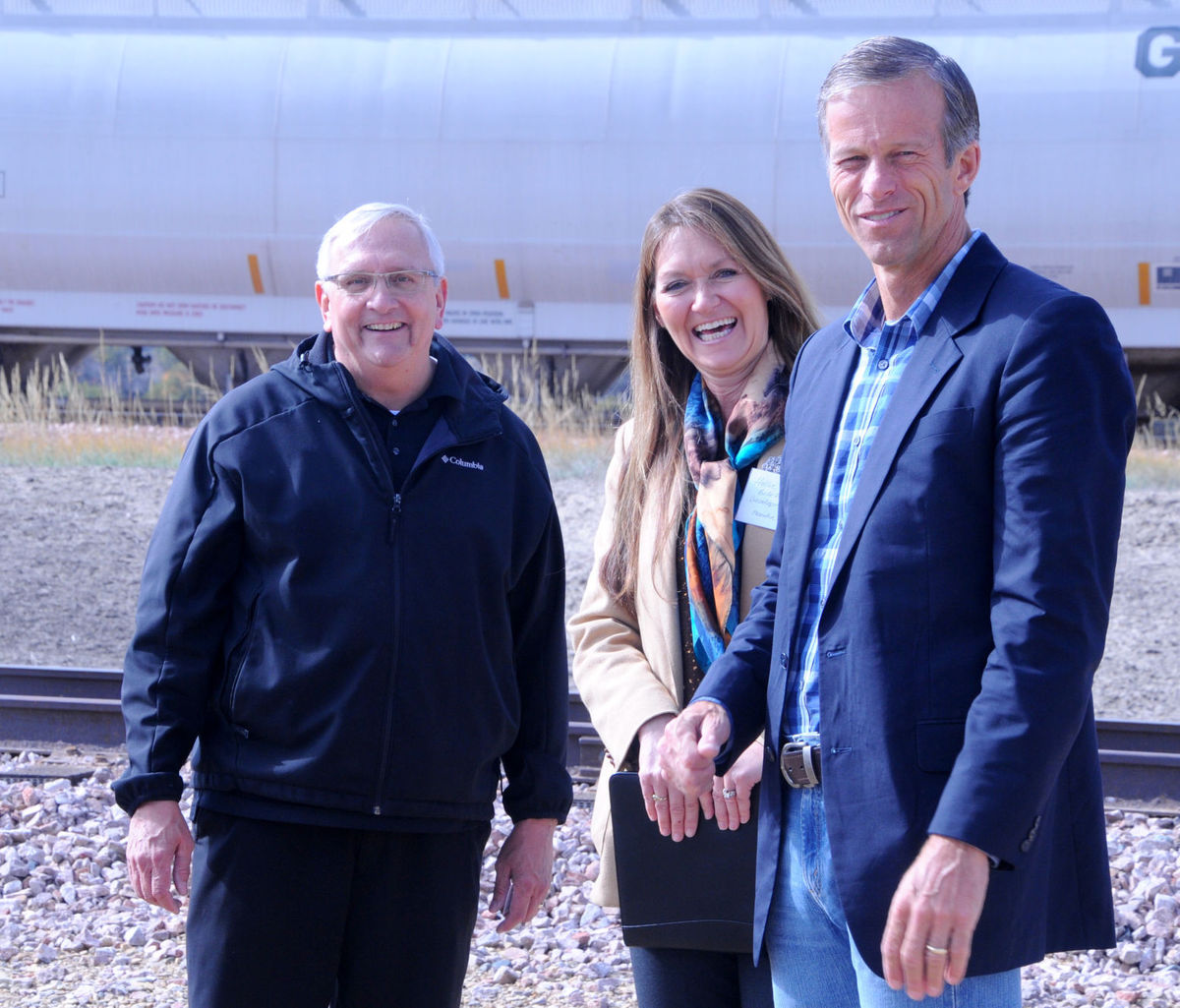  Photo credit: Milo Dailey, Butte County Post. Chamber Director Gary Wood and Belle Fourche EDC Executive Director Hollie Stalder stand with Senator John Thune at the Industrial Rail Park ribbon cutting.